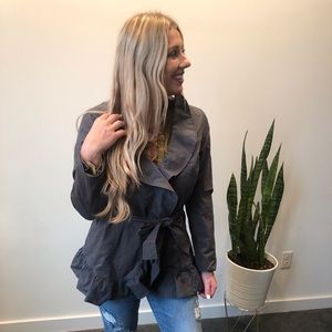 Tie jacket with ruffle bottom